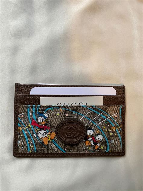 gucci card holder donald duck|Disney x Gucci Donald Duck card case.